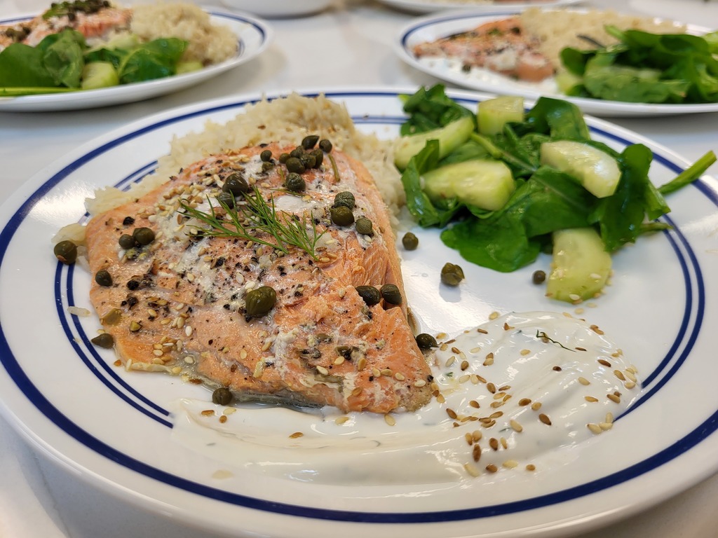 Team 2: poached salmon with dill sauce, sesame garlic rice, and salad 